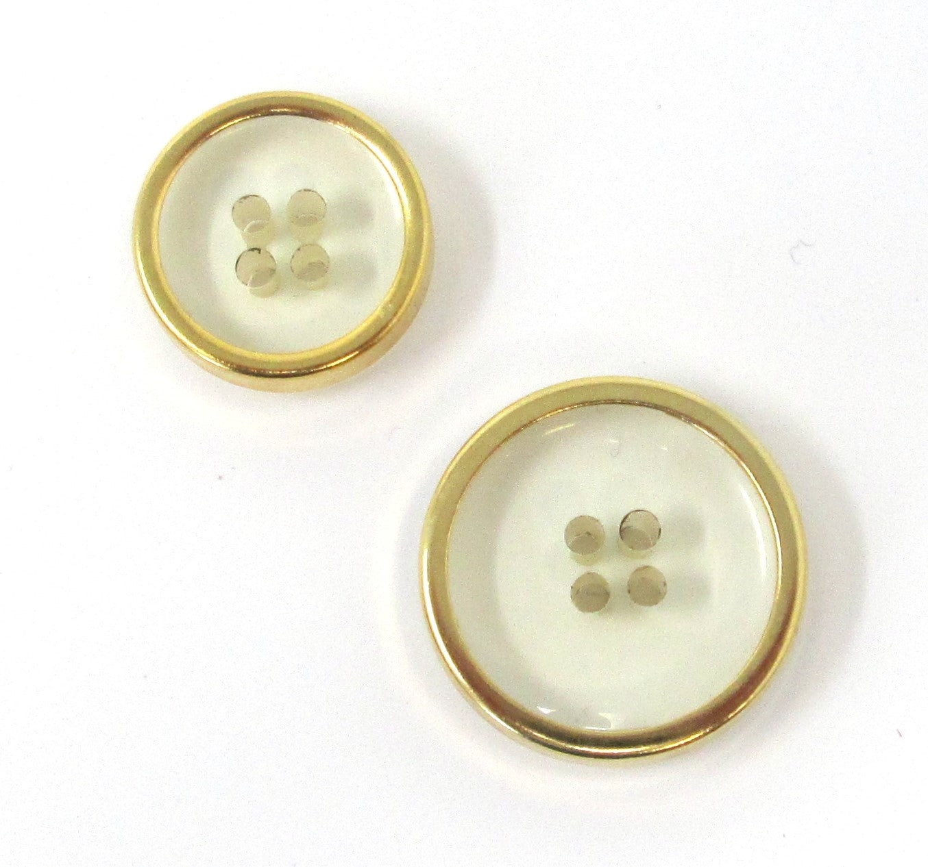 Clear, thick 4-hole buttons with goldtone rim