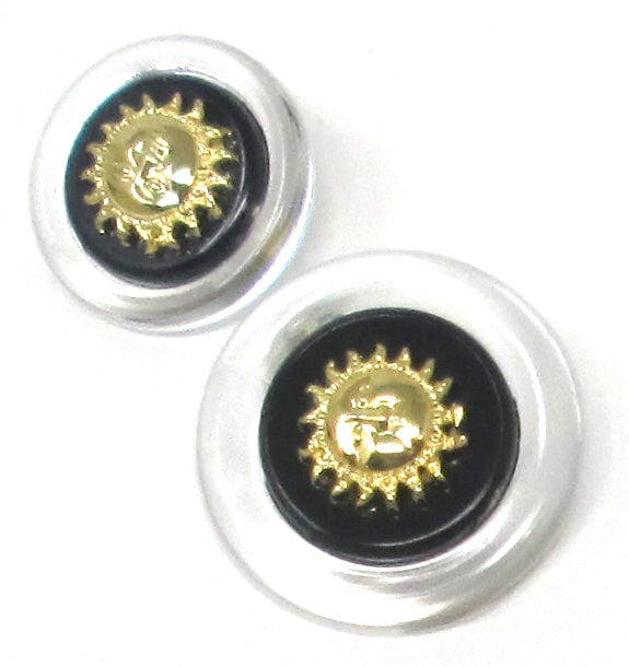 Clear, black/goldtone buttons with sun motif