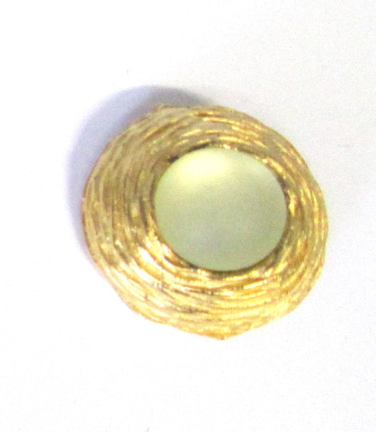 Soft gold with milky/clear cabachon center stone, $6/pc