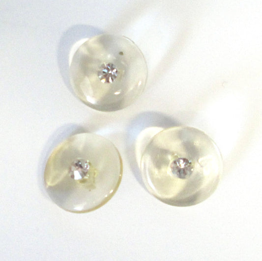 Clear shank buttons with rhinestone center