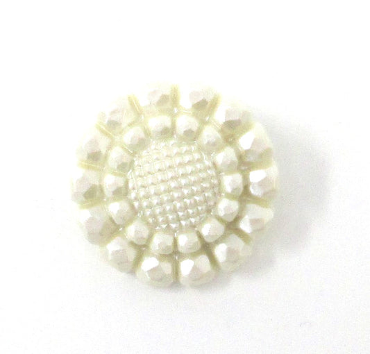 White slightly pearlized, textured button