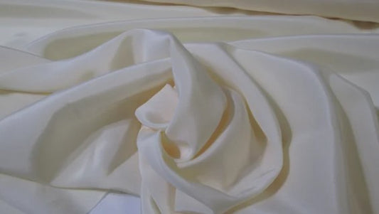 Pure silk crepe de chine in soft cream - $29/yd