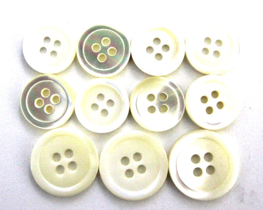 Mother of pearl four hole rimmed buttons